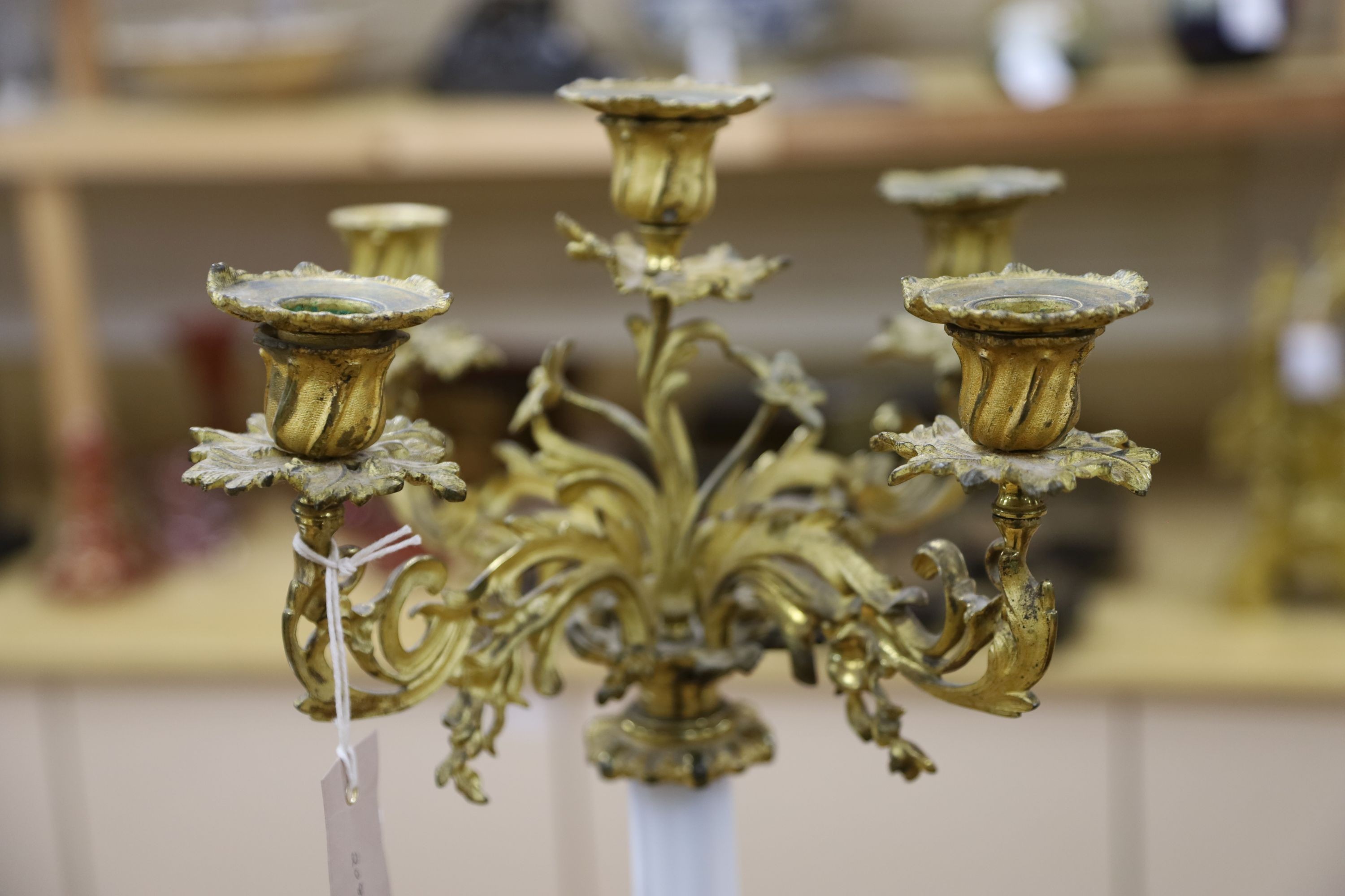 A 19th century ormolu and opaline glass five light candelabrum 63cm